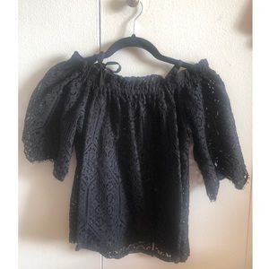 Lace embroidered off the shoulder top.